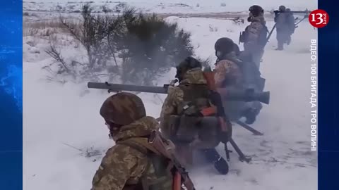 Ukrainian troops preparing for a battle on Belarus border in snowy weather