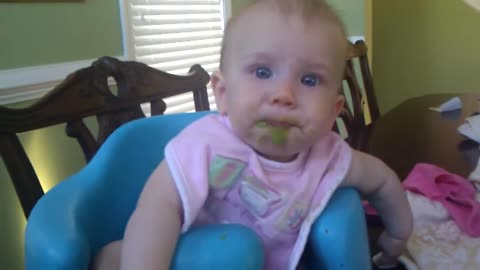 Little eating peas for the first time