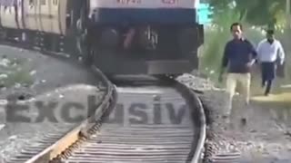 Idiot blocks a train for no reason then faces instant Justice.