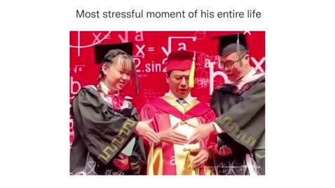 Hilarious Graduation Blooper: Student's Awkward Handshake Moment!