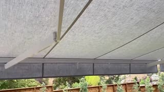 roof eave soffit installation of 2 budget awnings. patio enclosures