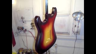 Filming a Sunburst being painted on a Stratocaster Style Body