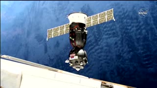 Soyuz spacecraft docks with stranded astronauts