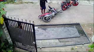 Gate Comes Crashing Down Onto Motorcycle