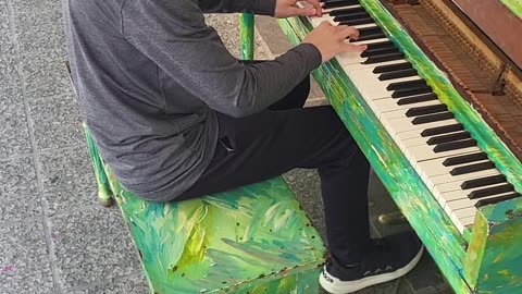 Jack plays Street Piano outside ASO