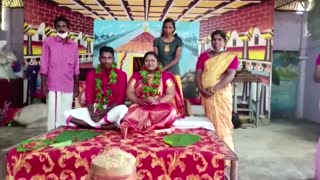 Indian couple float to wedding in cooking pot amid floods
