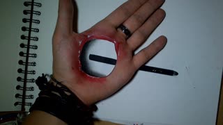 3D trick art - Artist draws hole in hand!