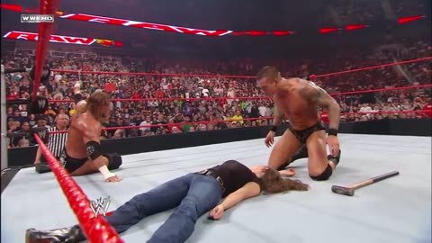 Randy Orton's Shocking Betrayal: Kiss, Sledgehammer, and Triple H