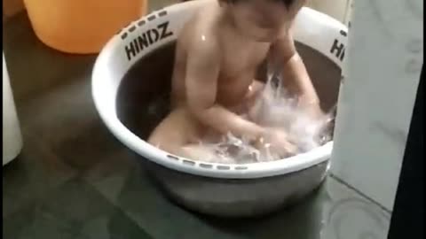 sweet baby having bath in tab