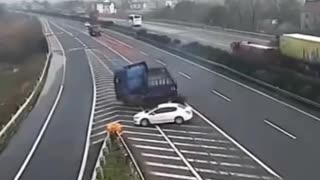 car stops on highway to not miss exit and causes trucks to lose control.