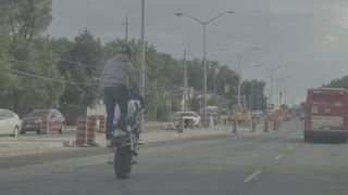 Brave Biker Doing Stupid Stunts