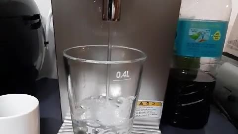 Video of pouring water into a cup with a water purifier