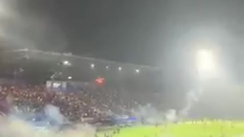 Indonesia: Scenes of chaos as riot police fires teargas into a packed football stadium