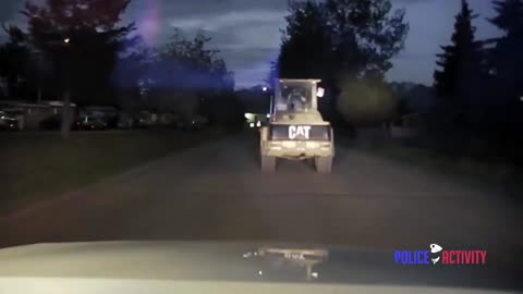 Dashcam Shows Slow Speed Police Chase Of Stolen Front Loader