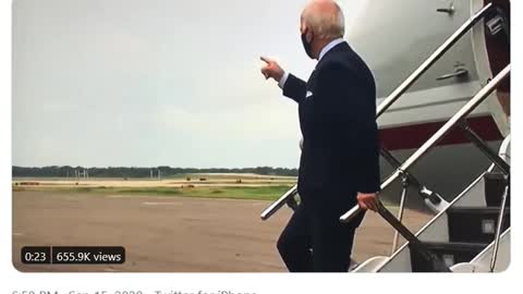 Biden waving to empty field