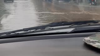 Driving a car when it rains in the city