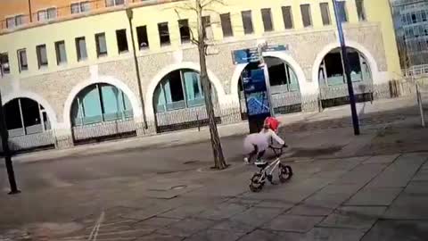 A cute little girl did salsa dance on bicycle 🥰