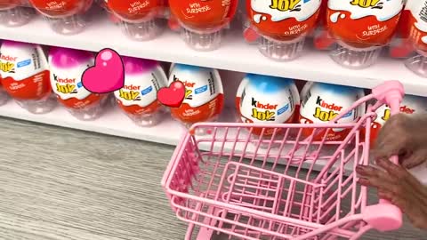 Bon Bon doing shopping in Toy store and eat Kinder Joy Egg chocolate with puppy