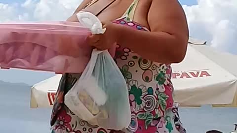 Food Vendor Goes Screaming For Customers On The Beach