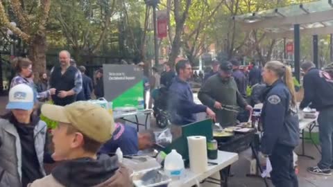 Seattle firefighters and Seattle police officers that were fired for not complying with the vaccine mandate are out feeding the homeless