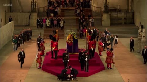 WOW! A guard hand-picked drops face first at the Queens Service?? Sudden Adult Death (SAD) by jab?