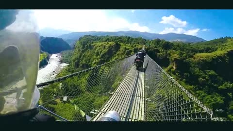 Royal Enfield Classic Bike on the Highest Suspension Bridge of Nepal