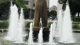 Guardian of Water.Friendship Statue and fountain.Love to Nature.