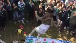 Guy jumping from roof to table