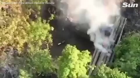 Ukrainian tanks destroy Russian artillery hidden in forest