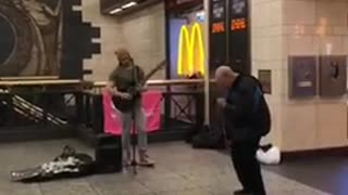 Penn station manhattan new york guitar music dance black jacket guy