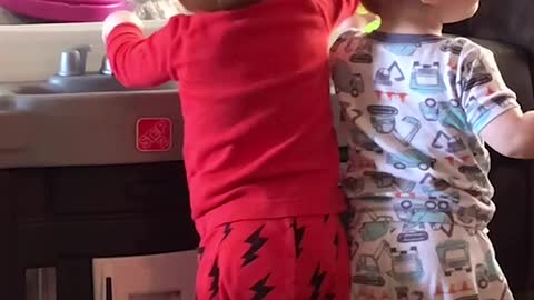 'Calm & composed toddler FINALLY loses it on his naughty twin brother '