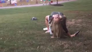 Drunk woman falls off white cooler