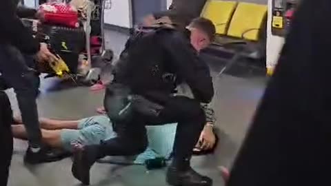 Video shows officer kicking man in head at Manchester Airport