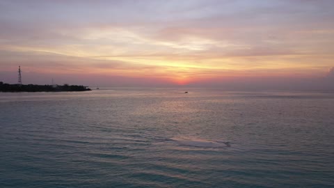 Aerial view of landscape of a calm sea at sunset