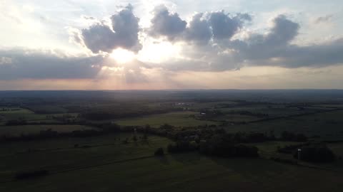 Drone captures beautiful sunset with stunning cumulus clouds in Peterborough County
