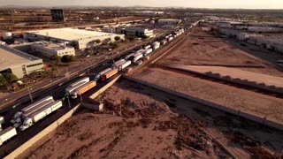 Long truck lines after U.S. suspends Juarez crossing