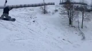 Grey snowboarder drop faceplant roll
