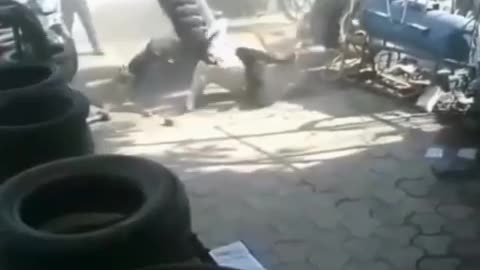 "Explosive Moment: Tractor Tyre Blast Caught on Camera!"