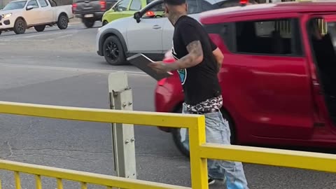 Man Gets Out of Moving a Car Without Missing a Beat