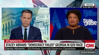 Stacey Abrams accuses Brian Kemp of "voter suppression"