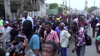 Police fire tear gas as hundreds protest in Haiti