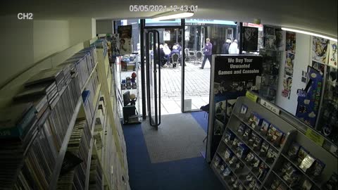 Man Walks Straight Into Shop Window