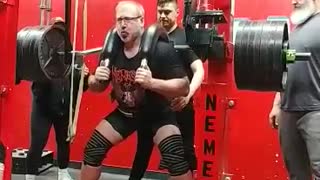 705 lb Marrs bar squat