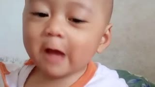 Cute baby vlog talking in front of the camera