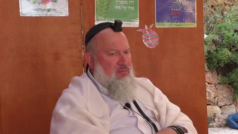 Rabbi David Bar-Hayim speaks in the Sukkah about Tefillin on Hol HaMoed