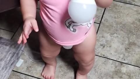 Baby lights up lightbulb