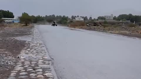 ATV Riders Spin Down Street