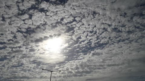 Pieces of clouds on a clear day