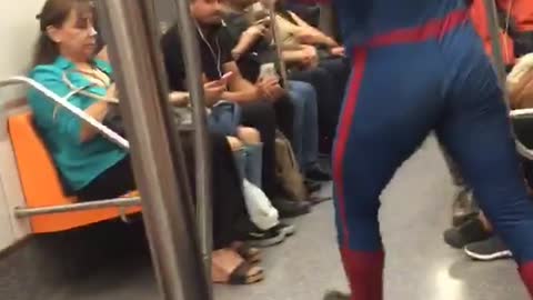 “Spiderman” Curves His Body In The Rhythm Of Scooby Doo Pa Pa On A Train