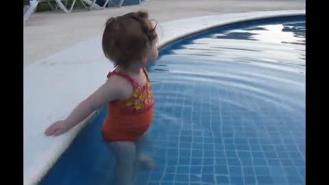 Funny BABY try to get the swimming POOL